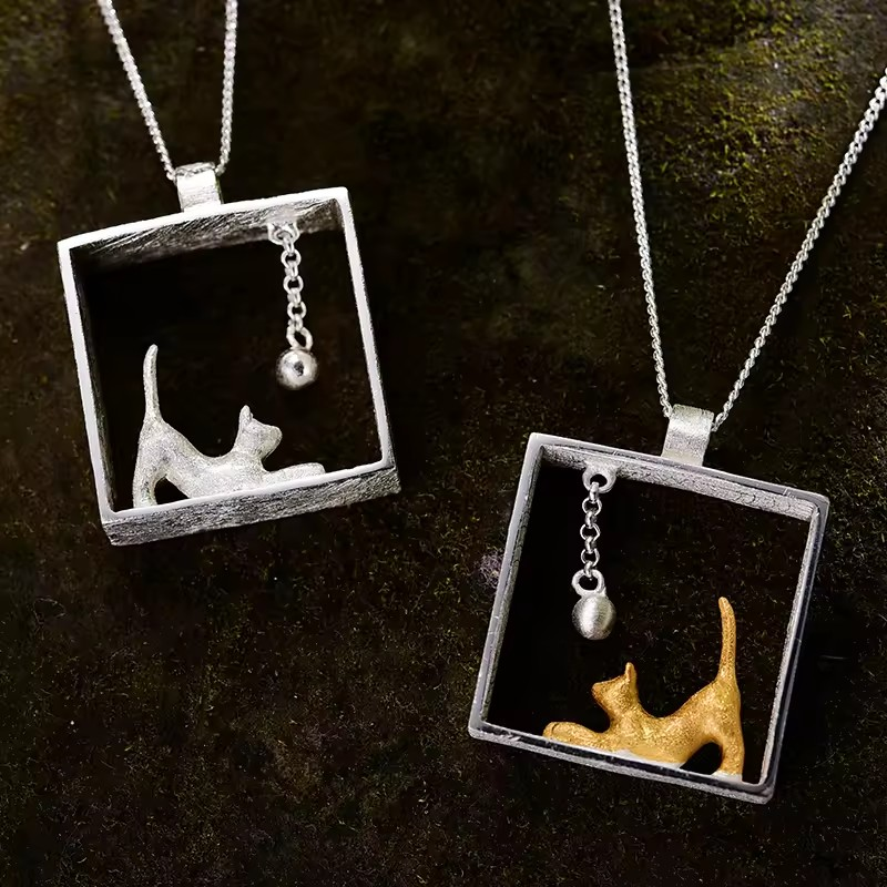 Necklace with pendant "Cat playing with ball", 925 silver, 18K gold